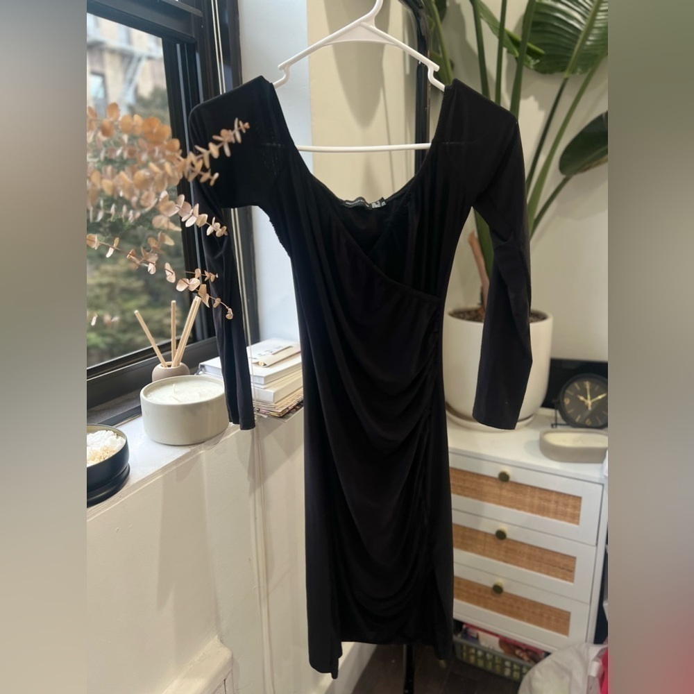 Black cocktail dress with sleeves